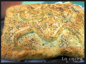 EMPANADA DE CHAMPIÑONES Y POLLO A LA NARANJA