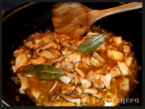 CALAMARES CON PIÑONES AL VINO